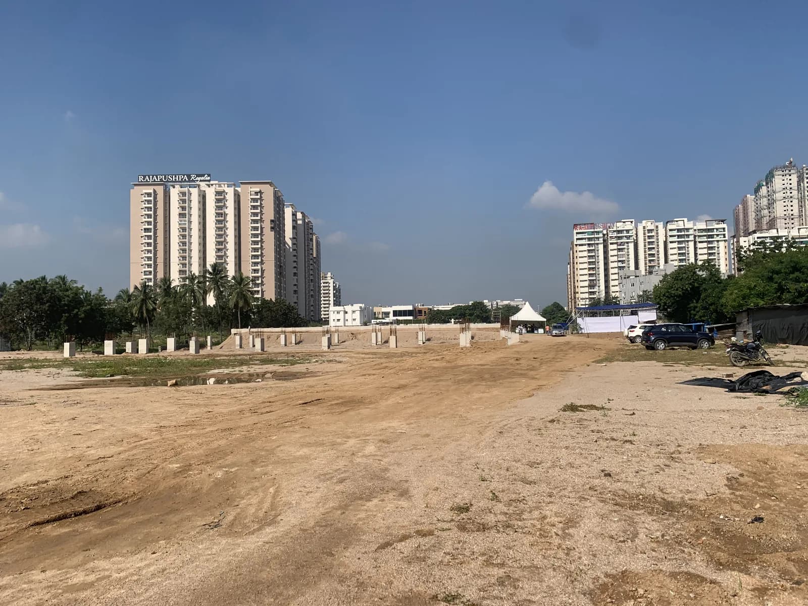 A wide view of the cleared site with piers set out
