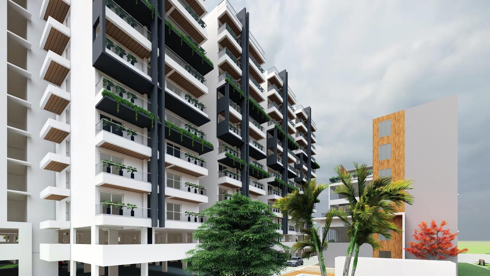 Planted balcony stacks running the length of the block under a heavy grey sky