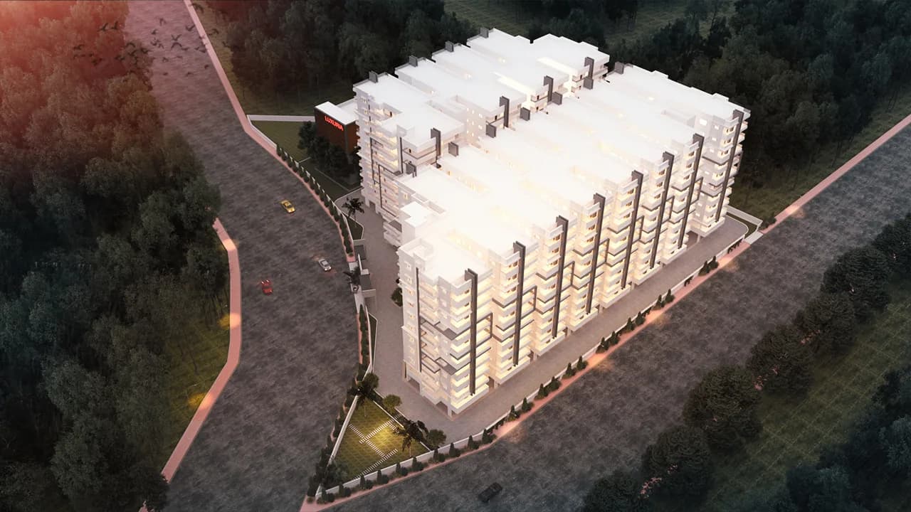 A night aerial render of the block with its facade lit