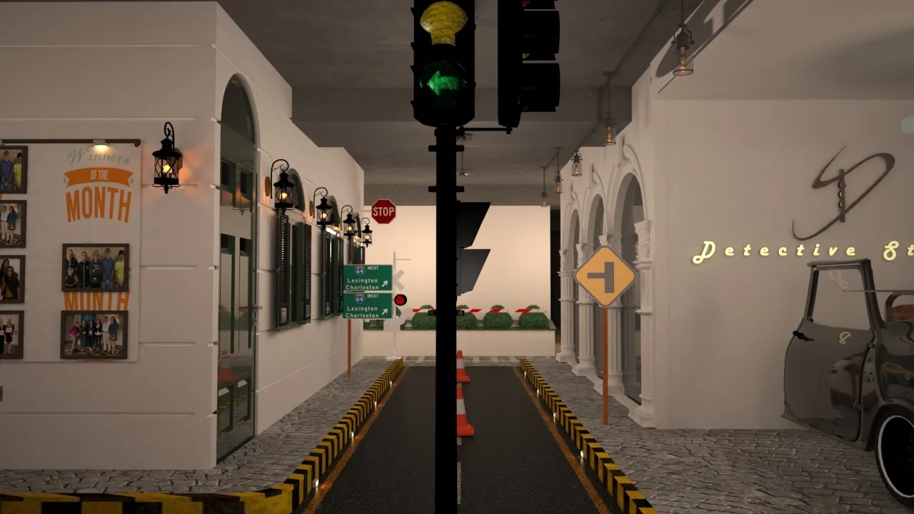 A traffic signal standing on the indoor roadway between two rows of facades