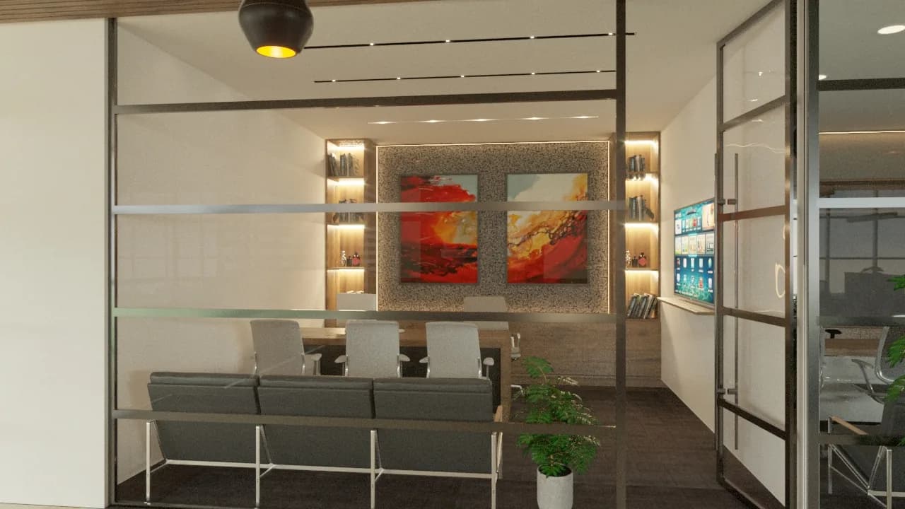 An office waiting area with backlit niches flanking framed artwork above bench seating