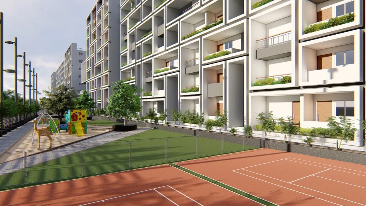 The planted elevation rising above a red sports court