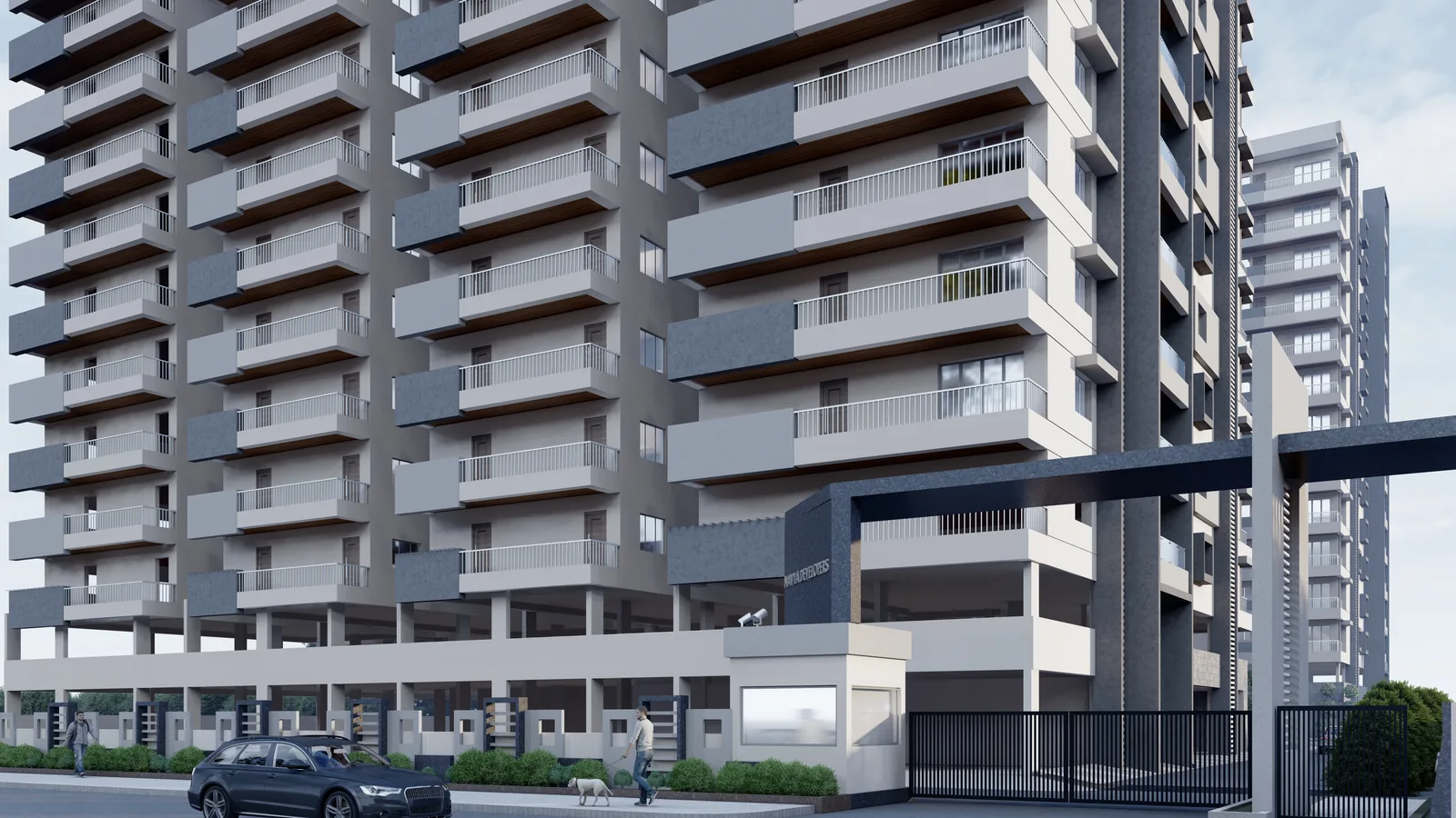 The base and podium of a residential tower seen in perspective along the street
