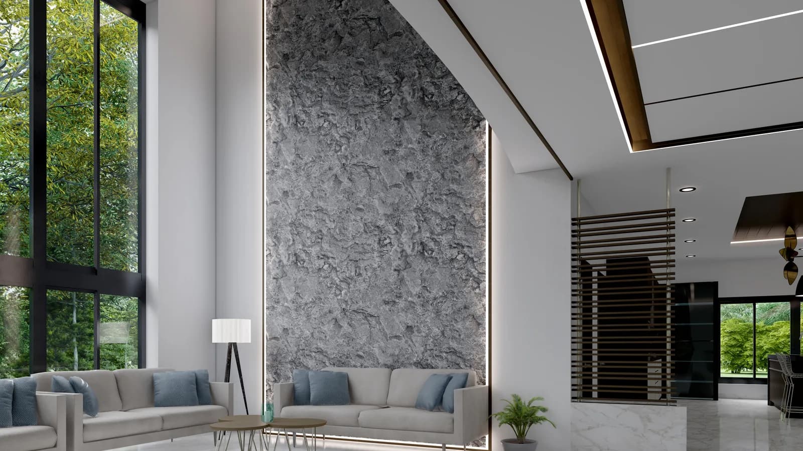 A double-height living room with a stone feature wall and full-height glazing