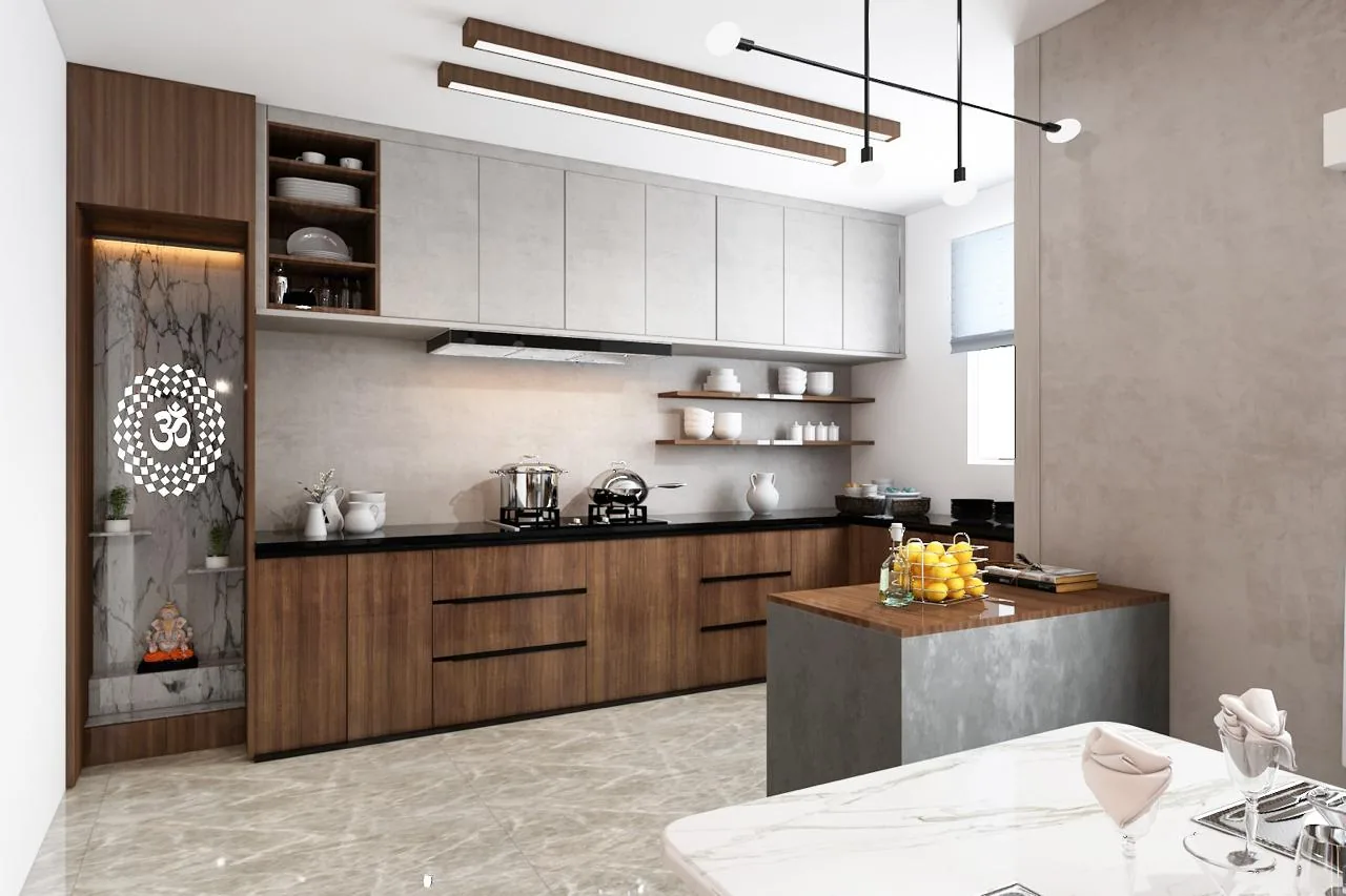 A kitchen in walnut and pale stone, the island lit by a linear pendant