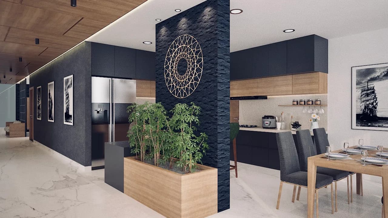 A dark stone column beside a timber planter of bamboo, marking the threshold to the kitchen