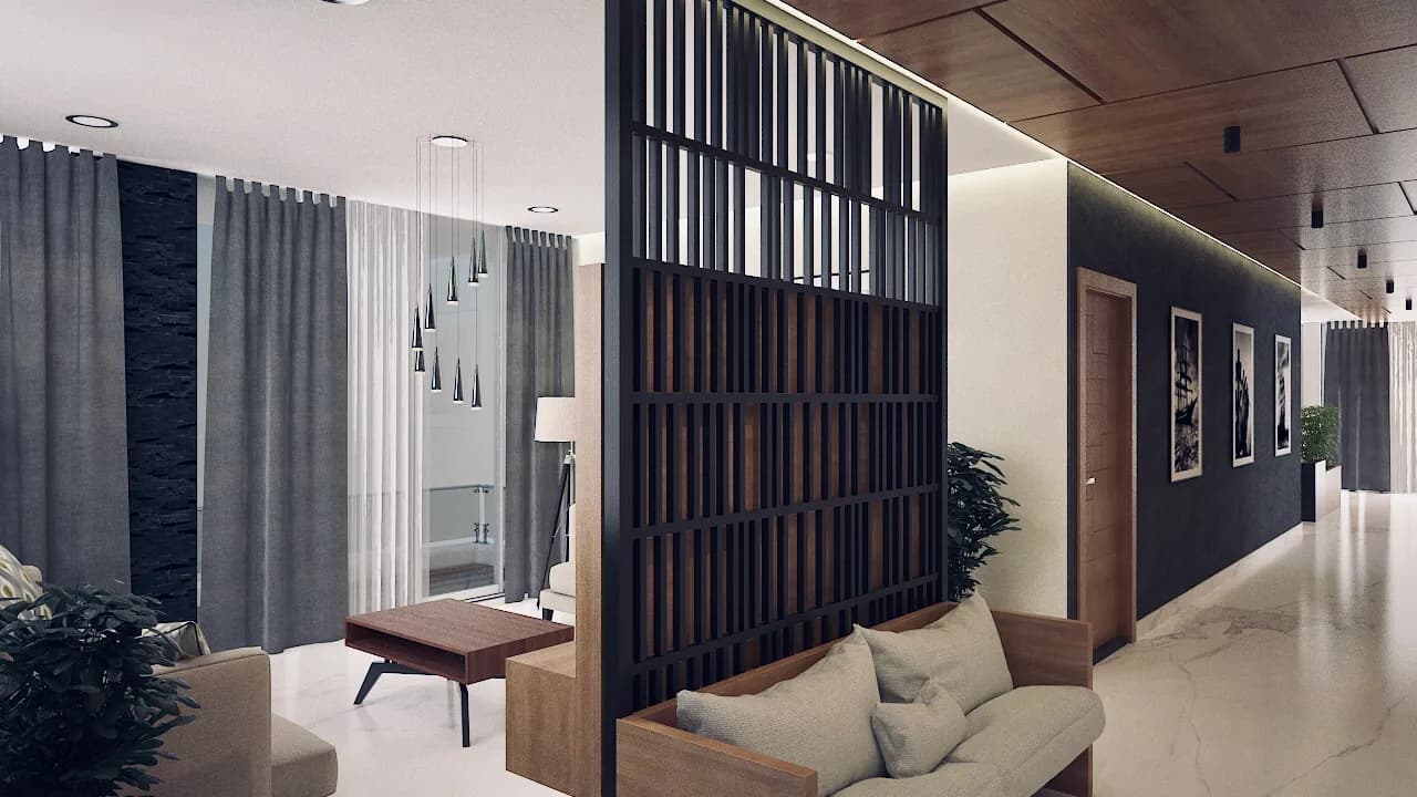 A living room seen past a floor-to-ceiling timber jali screen