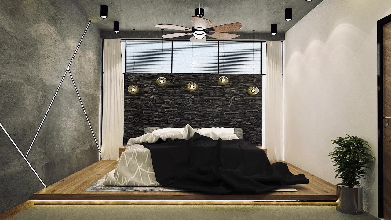 A bedroom seen from the foot of the bed, clerestory glazing above a dark stone head wall